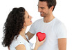 Photo: Woman giving man her heart Woman giving man her heart