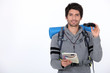 Backpacker with pair of binoculars
