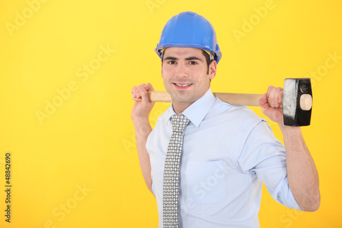 Photo: Builder holding hammer Builder holding hammer