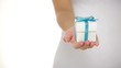 Present or gift box in female hands