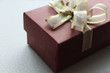 Little gift box with golden ribbon