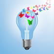 Eco concept design, butterfly flying out from light bulb