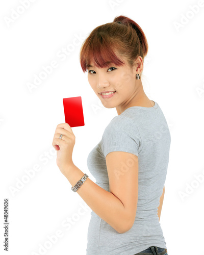 Photo: Isolated Young Asian Woman With a Credit Card Isolated Young Asian Woman With a Credit Card