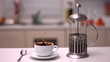Sugar cube falling in coffee