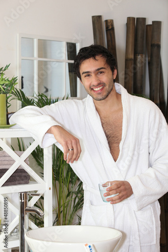Photo: Man in bathroom Man in bathroom