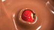 Strawberry falling into melted chocolate close up