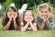 Girls lying on grass