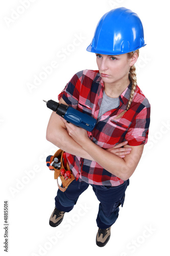 Photo: Grumpy female carpenter Grumpy female carpenter