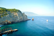 Beautiful rocks and blue sea. Bright horizon