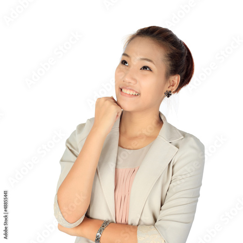 Photo: Isolated young business woman over white Isolated young business woman over white
