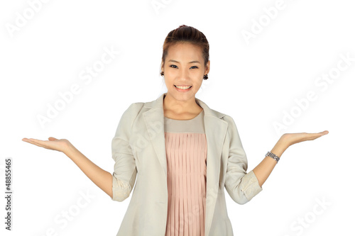 Photo: Isolated young business woman over white Isolated young business woman over white