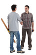 Two carpenters shaking hands