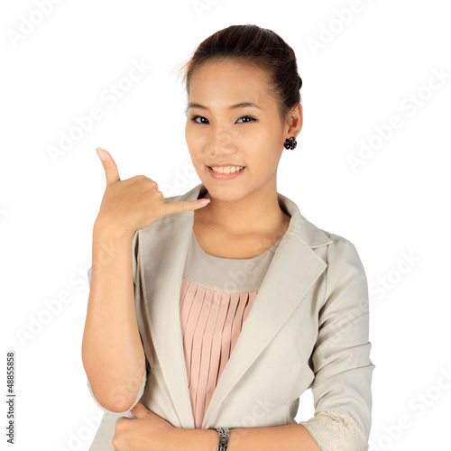 Photo: Isolated young business woman over white Isolated young business woman over white
