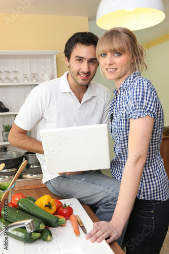 Photo: Couple cooking Couple cooking