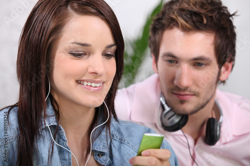 Photo: Couple listening to music Couple listening to music