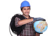 Electrician holding globe