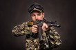 Soldier aiming a machine gun