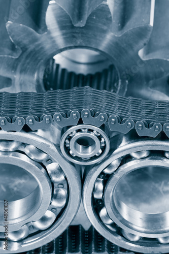 Photo: ball-bearings and timing chain, duplex blue toning concept ball-bearings and timing chain, duplex blue toning concept