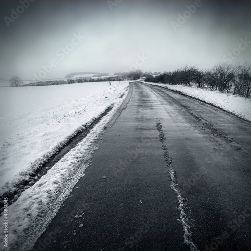 Photo: gloomy winter road gloomy winter road
