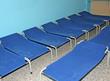 chairs and tables of a reconstruction of an ancient Italian peas