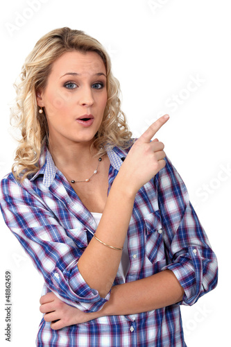 Photo: young blonde woman showing something young blonde woman showing something