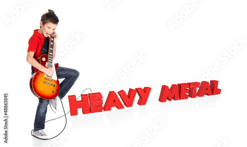 Photo: Boy plays on electric guitar with 3d text Boy plays on electric guitar with 3d text