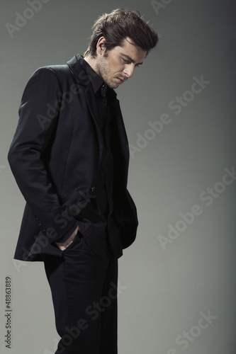 Photo: Stylish and handsome bussinesman in natural pose Stylish and handsome bussinesman in natural pose