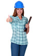 Woman in a hardhat with a clipboard
