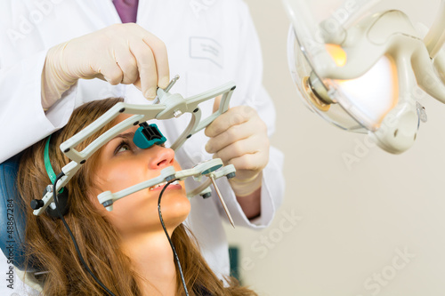 Photo: Patient with Dentist - dental treatment Patient with Dentist - dental treatment