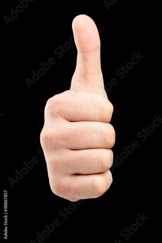 Photo: Male hand giving a thumb up Male hand giving a thumb up