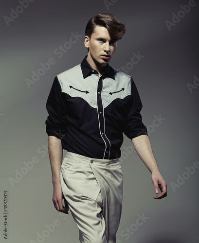Photo: Handsome man wearing black&white shirt Handsome man wearing black&white shirt
