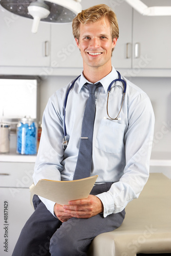 Photo: Portrait Of Doctor In Doctor's Office Portrait Of Doctor In Doctor's Office