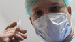 Doctor with syringe