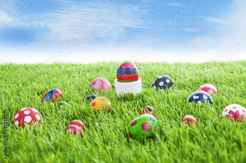 Photo: Easter eggs on grass horizontal Easter eggs on grass horizontal