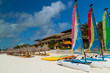 Colorful sail catamarans on the Caribbean beach