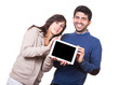 Happy Young Couple with Tablet PC