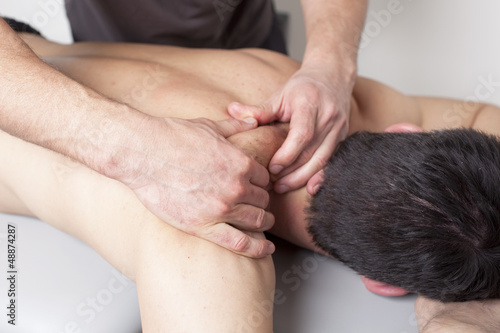 Photo: physical therapist applying myofascial therapy physical therapist applying myofascial therapy