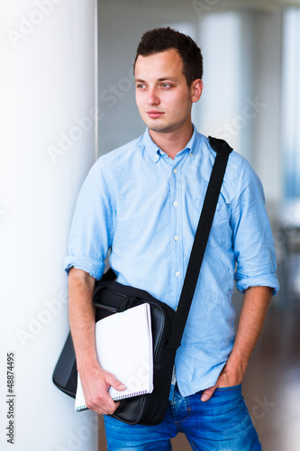 Photo: Handsome college student on campus Handsome college student on campus