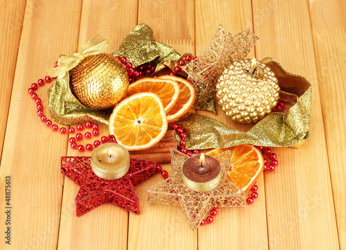 Photo: Christmas composition with candles and decorations Christmas composition with candles and decorations