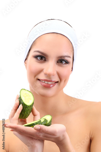 Photo: Young woman with fruit.Concept: Facial fruit masks. Isolated Young woman with fruit.Concept: Facial fruit masks. Isolated