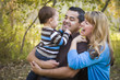 Photo: Happy Mixed Race Ethnic Family Playing In The Park Happy Mixed Race Ethnic Family Playing In The Park