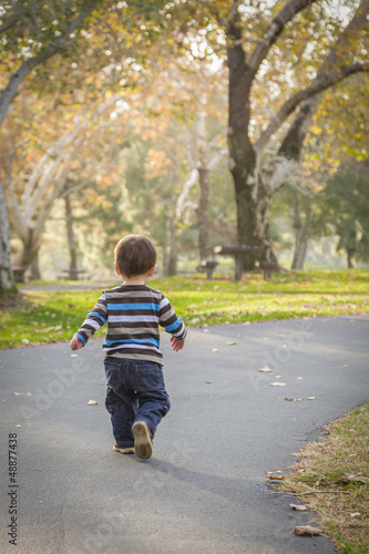 Photo: Young Baby Boy Walking in the Park Young Baby Boy Walking in the Park