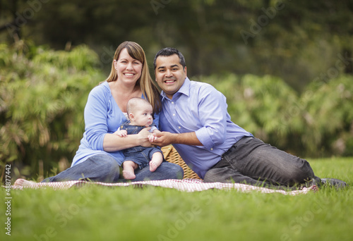 Photo: Happy Mixed Race Family Playing In The Park Happy Mixed Race Family Playing In The Park