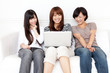 attractive asian women relaxing on the sofa