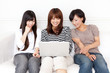attractive asian women relaxing on the sofa
