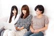 attractive asian women relaxing on the sofa