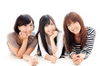 attractive asian women relaxing on white background