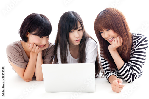 Photo: attractive asian women relaxing on white background attractive asian women relaxing on white background