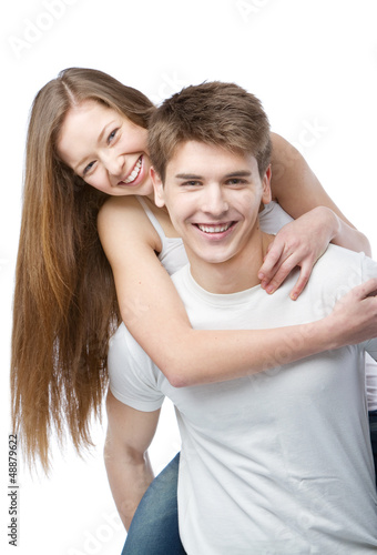 Photo: Young couple in white t-shirts Young couple in white t-shirts