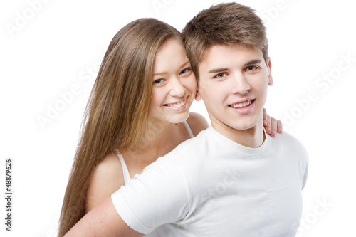 Photo: Young couple in white t-shirts Young couple in white t-shirts